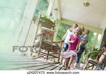 Family on porch View Large Photo Image Stock Image - Family on porch. Fotosearch