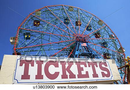 Ferris wheel and tickets sign at fairgrounds View Large Photo Image Stock Image - Ferris wheel and tickets sign at fairgrounds. Fotosearch