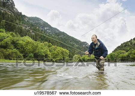 Fly fisherman View Large Photo Image Stock Photo - Fly fisherman. Fotosearch