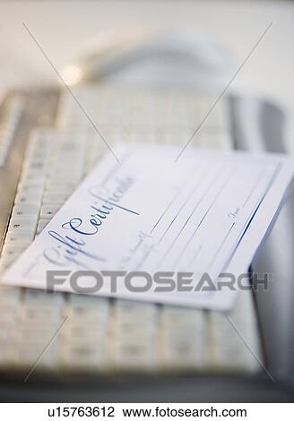 Gift certificate on computer keyboard View Large Photo Image Stock Image - Gift certificate on computer keyboard. Fotosearch