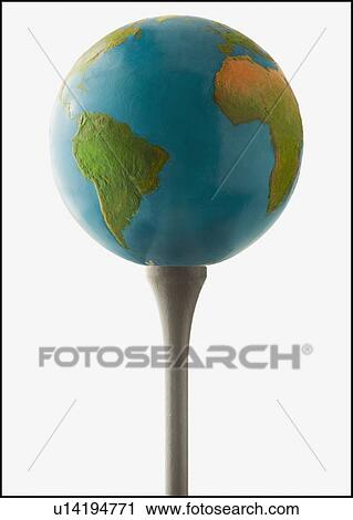 Stock Image - Globe on golf tee. Fotosearch