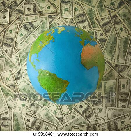 Globe on top of money View Large Photo Image Stock Image - Globe on top of money. Fotosearch