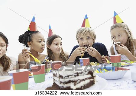 Group of children at a birthday party View Large Photo Image Stock Image - Group of children at a birthday party. Fotosearch