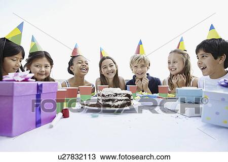 Group of children at a birthday party View Large Photo Image Stock Image - Group of children at a birthday party. Fotosearch