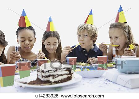 Group of children at a birthday party View Large Photo Image Stock Photograph - Group of children at a birthday party. Fotosearch