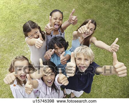Group of children with their thumbs up View Large Photo Image Stock Photo - Group of children with their thumbs up. Fotosearch