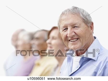 Stock Image - Group of seniors standing in a row. Fotosearch