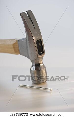 Hammer and nail View Large Photo Image Stock Image - Hammer and nail. Fotosearch
