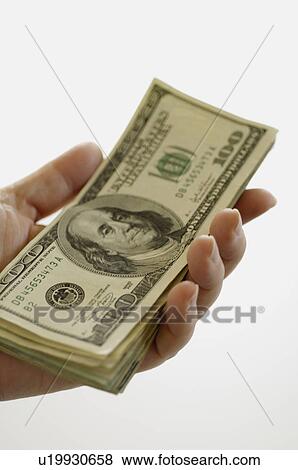 Hand holding money View Large Photo Image Stock Photo - Hand holding money. Fotosearch
