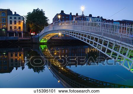 Ha'penny bridge and River Liffey at night View Large Photo Image Stock Image - Ha'penny bridge and River Liffey at night. Fotosearch