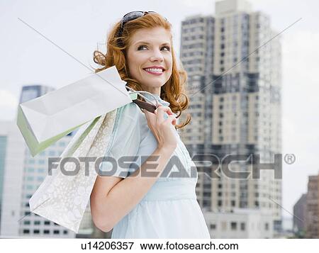 Stock Photo - Happy consumer. Fotosearch