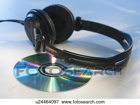 Stock Photo - Headphones and CD. Fotosearch