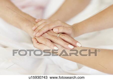 Holding hands View Large Photo Image Stock Image - Holding hands. Fotosearch