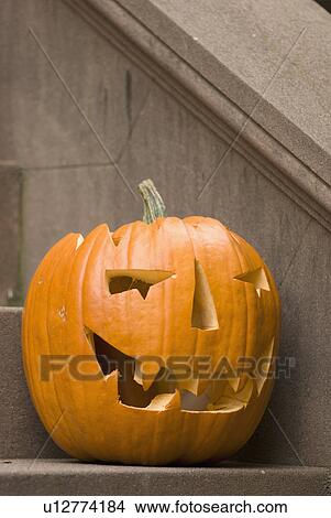 Picture - Jack-o-lantern on step. Fotosearch