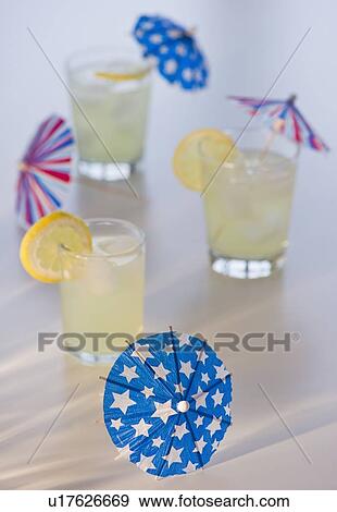 Stock Photo - Lemonade and Americana drink umbrellas. Fotosearch