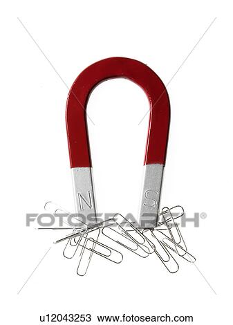 Magnet and paper clips View Large Photo Image Stock Image - Magnet and paper clips. Fotosearch