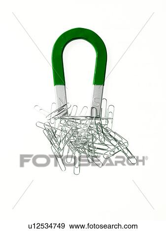 Stock Photo - Magnet and paper clips. Fotosearch