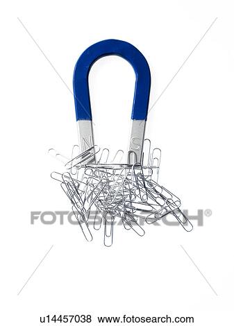 Magnet and paper clips View Large Photo Image Stock Photo - Magnet and paper clips. Fotosearch