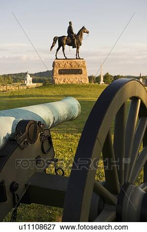 Stock Photo - Meade statue behind cannon. Fotosearch
