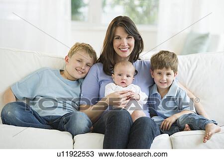 Mother and her three children View Large Photo Image Stock Image - Mother and her three children. Fotosearch
