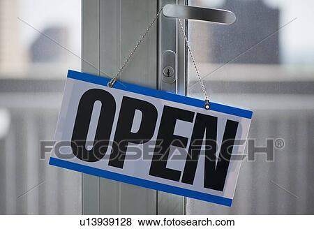 Stock Photo - Open sign hanging on door. Fotosearch