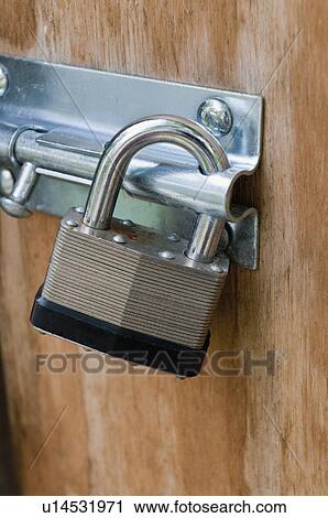 Padlock on door View Large Photo Image Stock Image - Padlock on door. Fotosearch