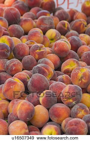 Stock Photo - Peaches at farmer's market. Fotosearch