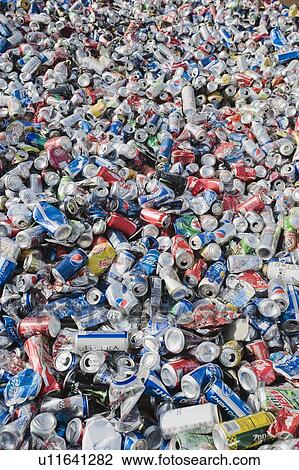 Stock Image - Pile of aluminum cans at recycling plant. Fotosearch