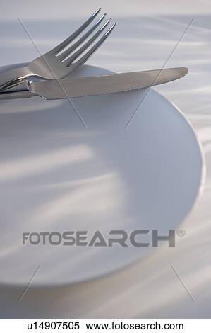 Stock Photography - Plate knife and fork. Fotosearch