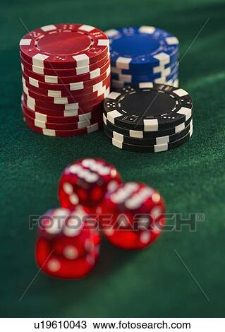 Stock Image - Poker chips and dice. Fotosearch