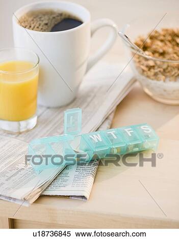 Prescription pills on breakfast table View Large Photo Image Stock Photography - Prescription pills on breakfast table. Fotosearch