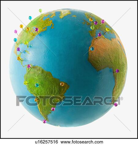 Stock Photograph - Push pins on globe. Fotosearch