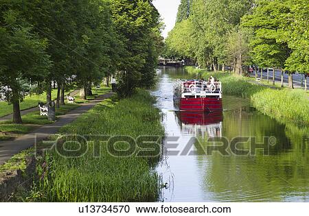 River boat on Grand Canal in Dublin Ireland View Large Photo Image Stock Image - River boat on Grand Canal in Dublin Ireland. Fotosearch
