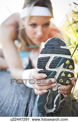 Runner stretching View Large Photo Image Stock Image - Runner stretching. Fotosearch