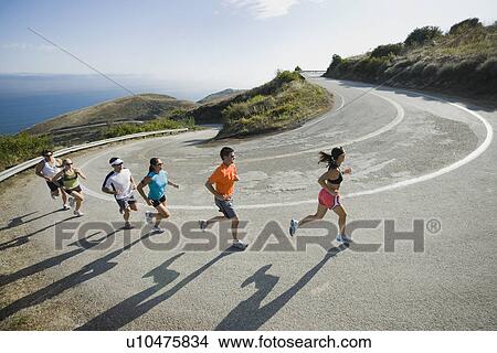 Runners on a road in Malibu View Large Photo Image Picture - Runners on a road in Malibu. Fotosearch