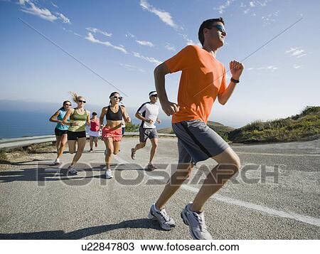 Runners on a road in Malibu View Large Photo Image Stock Image - Runners on a road in Malibu. Fotosearch