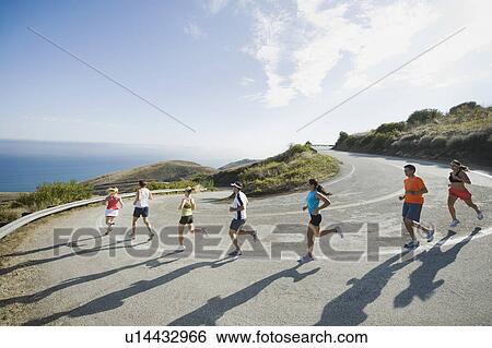 Runners on a road in Malibu View Large Photo Image Stock Photograph - Runners on a road in Malibu. Fotosearch