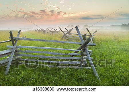 Rustic fence in field View Large Photo Image Stock Image - Rustic fence in field. Fotosearch
