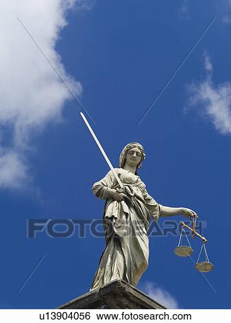 Scales of justice statue on the Dublin castle View Large Photo Image Stock Photograph - Scales of justice statue on the Dublin castle. Fotosearch