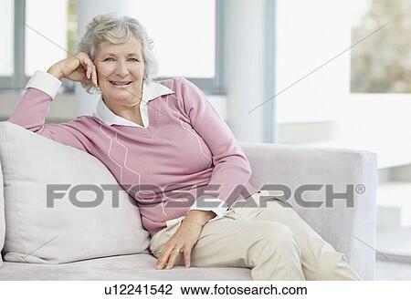Stock Image - Senior woman relaxing. Fotosearch