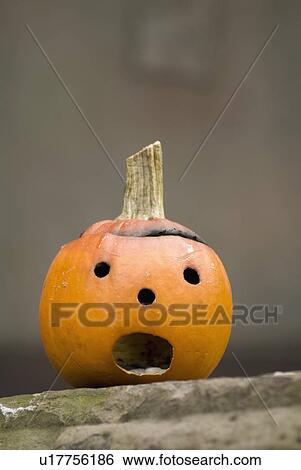 Stock Photograph - Small jack-o-lantern. Fotosearch