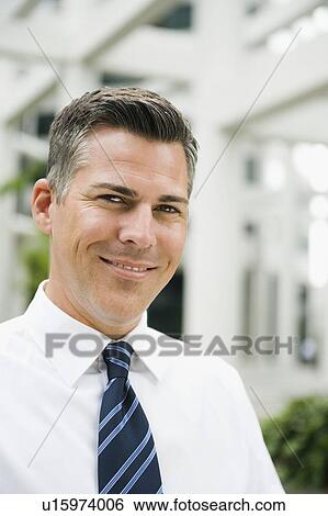 Smiling businessman View Large Photo Image Stock Photograph - Smiling businessman. Fotosearch
