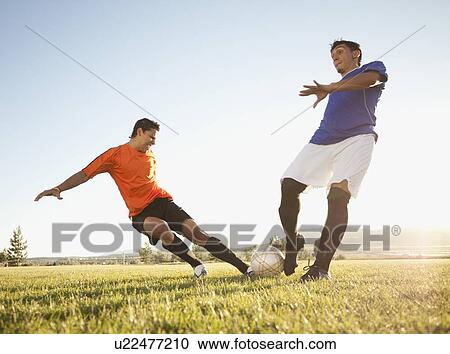 Stock Image - Soccer game. Fotosearch