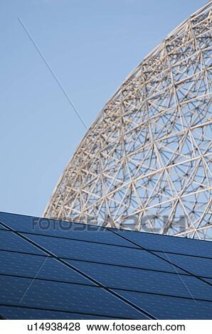 Stock Photo - Solar panels and biosphere framing. Fotosearch