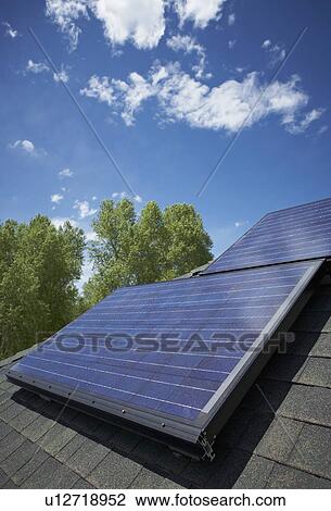 Solar panels on roof View Large Photo Image Stock Image - Solar panels on roof. Fotosearch