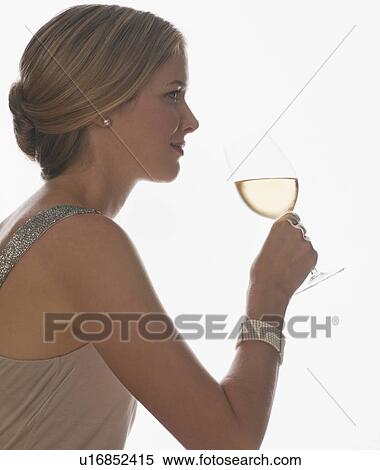 Sophisticated woman drinking wine View Large Photo Image Stock Photography - Sophisticated woman drinking wine. Fotosearch