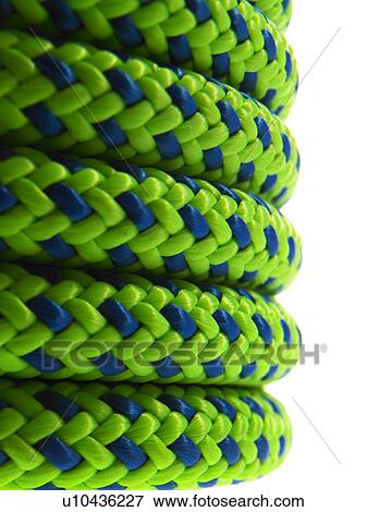 Stock Photo - Stack of green and blue rope. Fotosearch