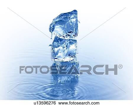 Stock Photograph - Stack of ice cubes in water. Fotosearch