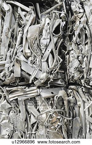 Stacks of recycled metal View Large Photo Image Stock Photograph - Stacks of recycled metal. Fotosearch
