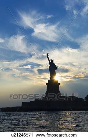 Statue of liberty at dusk View Large Photo Image Stock Image - Statue of liberty at dusk. Fotosearch